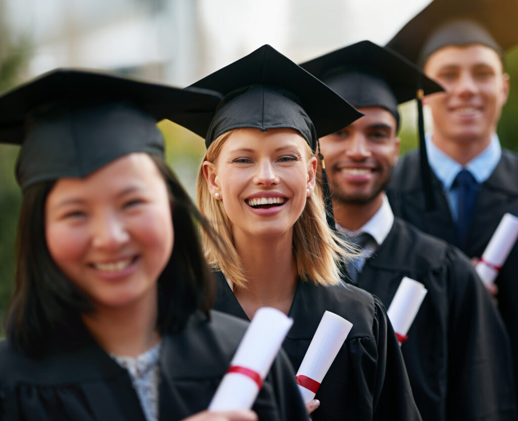 Smiling new grads.
